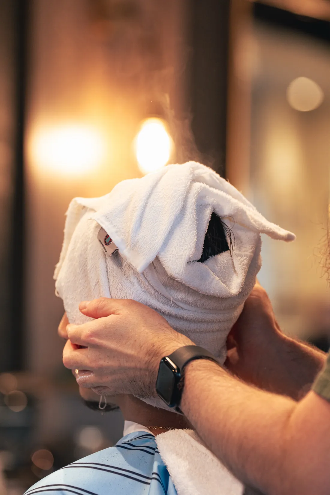 A hot towel shave in progress